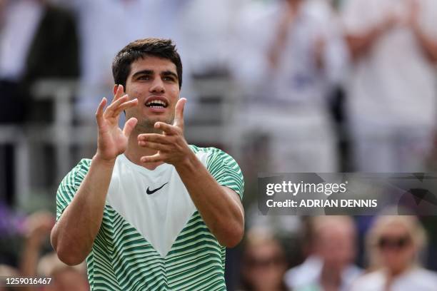 Spain's Carlos Alcaraz celebrates after winning against US player Sebastian Korda during their men's semi-final match at the Cinch ATP tennis...