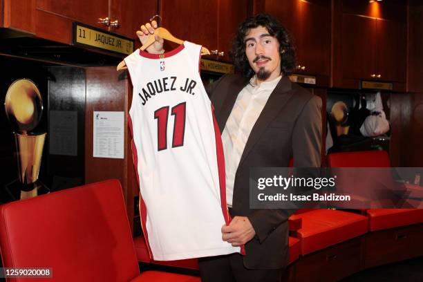 Jaime Jaquez Jr. #11 of the Miami Heat receives his uniform on June 23, 2023 at Kaseya Center in Miami, Florida. NOTE TO USER: User expressly...