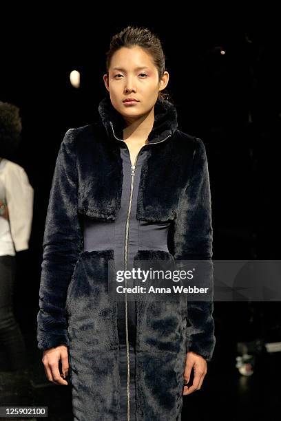 Model poses during the Yuna Yang Fall 2011 presentation during Mercedes-Benz Fashion Week at The Alvin Ailey Citigroup Theater on February 13, 2011...