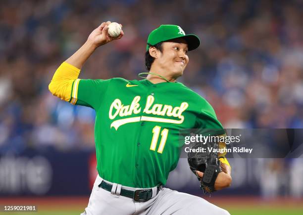 Shintaro Fujinami of the Oakland Athletics pitches in the first inning against the Toronto Blue Jays at Rogers Centre on June 24, 2023 in Toronto,...