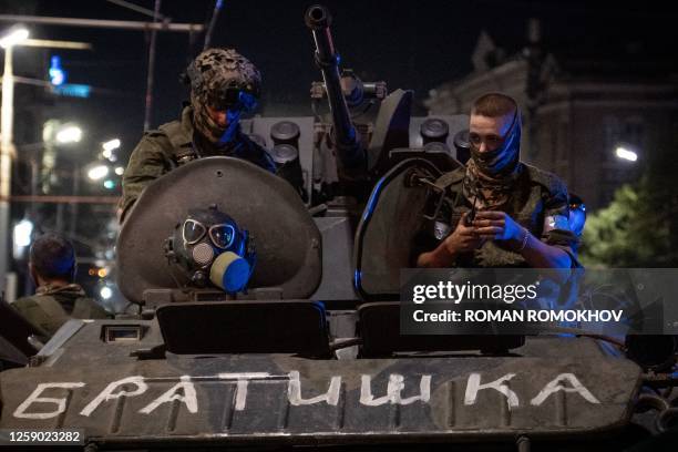 Members of Wagner group looks from a military vehicle with the sign read as "Brother" in Rostov-on-Don late on June 24, 2023. Rebel mercenary leader...