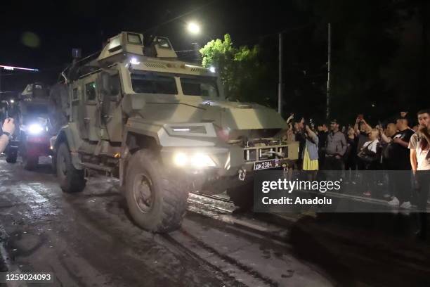 Members of the Wagner Group prepare to depart from the Southern Military District's headquarters and return to their base on June 24, 2023 in...