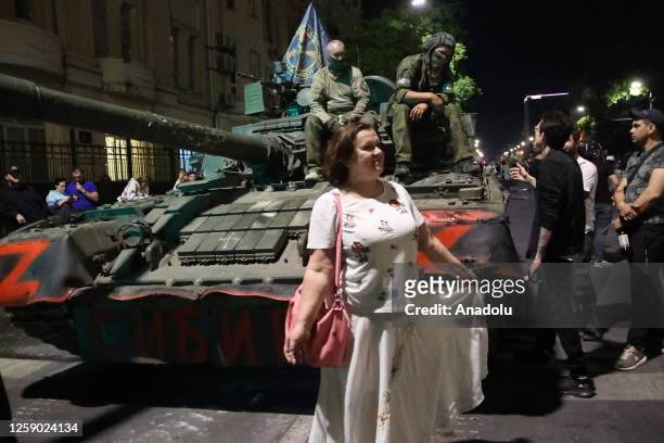 Woman poses for a photo in front of the Wagner Group military vehicle on June 24, 2023 in Rostov-on-Don, Russia.