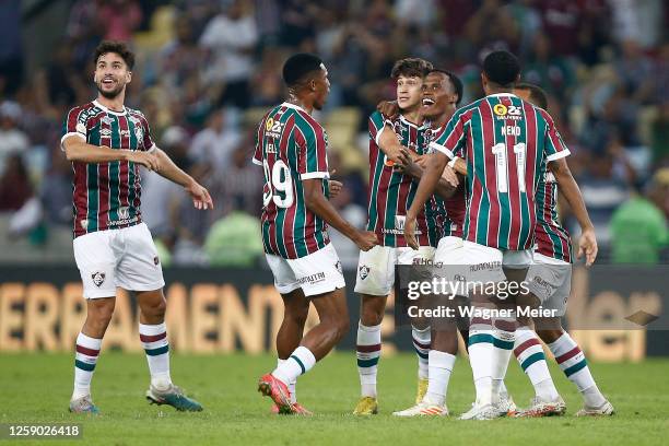 Gabriel Pirani of Fluminense celebrates with teammates after scoring the team's second goal during the match between Fluminense and Bahia as part of...