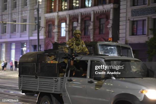 Members of the Wagner Group prepare to depart from the Southern Military District's headquarters and return to their base on June 24, 2023 in...