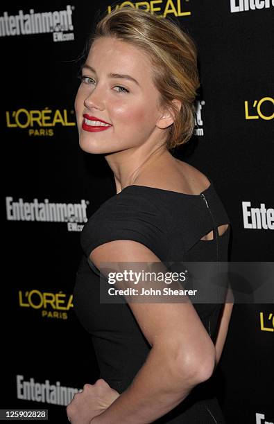 Actress Amber Heard arrives at Entertainment Weeklys celebration honoring the 17th Annual Screen Actors Guild Awards nominees hosted by Jess Cagle...