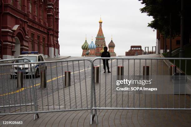 Policeman stands on guard at the closed Red Square in Moscow. On the morning of June 24, the center of the Russian capital was in a peaceful state...