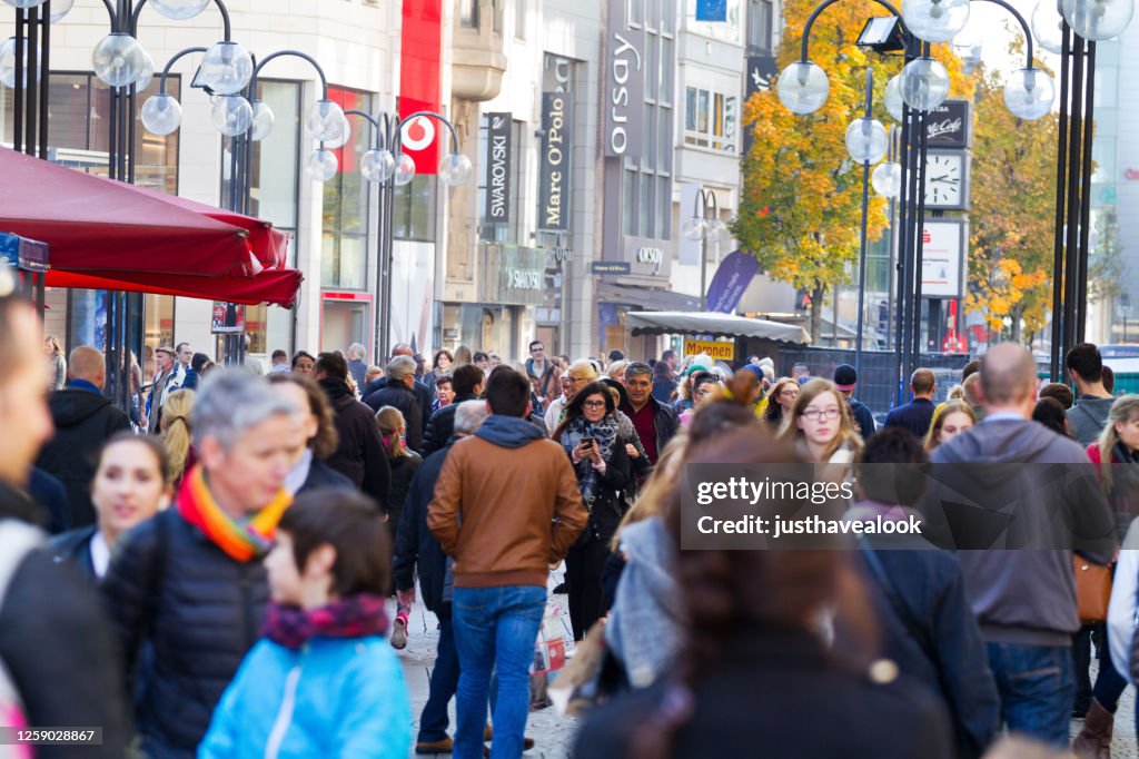Crowd of people in street Schildergasse in Cologne