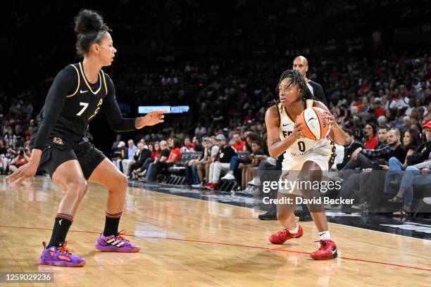 Kelsey Mitchell of the Indiana Fever looks to pass the ball during the game against the Las Vegas Aces on June 24, 2023 at Michelob ULTRA Arena in...