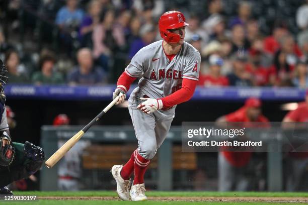 Mickey Moniak of the Los Angeles Angels hits an eighth inning double in a game against the Colorado Rockies at Coors Field on June 24, 2023 in...