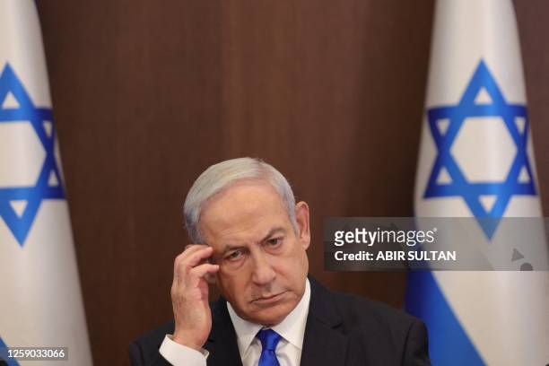 Israeli Prime Minister Benjamin Netanyahu attends the weekly cabinet meeting in his office in Jerusalem, on June 25, 2023.