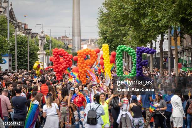 crowd at start of dublin pride festival 2019 - gay pride parade stock pictures, royalty-free photos & images