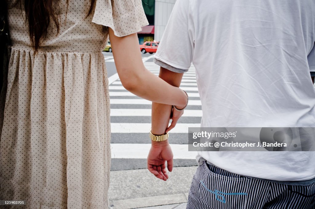 Couple arm in arm