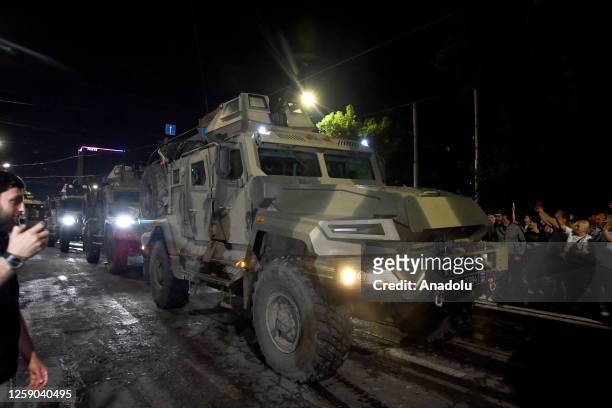 Members of the Wagner Group prepare to depart from the Southern Military District's headquarters and return to their base in Rostov-on-Don, Russia on...