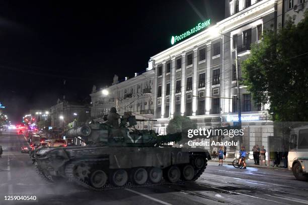 Members of the Wagner Group prepare to depart from the Southern Military District's headquarters and return to their base in Rostov-on-Don, Russia on...