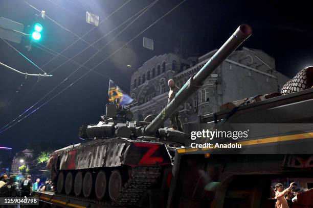 Members of the Wagner Group prepare to depart from the Southern Military District's headquarters and return to their base in Rostov-on-Don, Russia on...