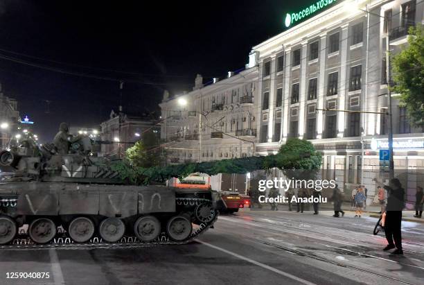 Members of the Wagner Group prepare to depart from the Southern Military District's headquarters and return to their base in Rostov-on-Don, Russia on...