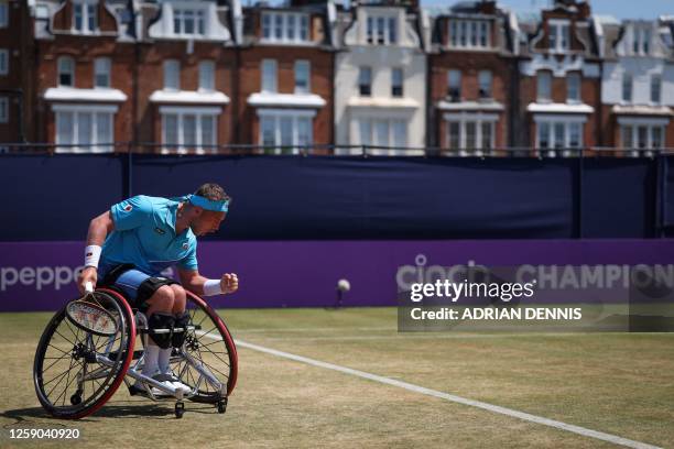 Britain's Alfie Hewett celebrates after winning a set against Belgium's Joachim Gerard during their wheelchair men's singles final match at the Cinch...