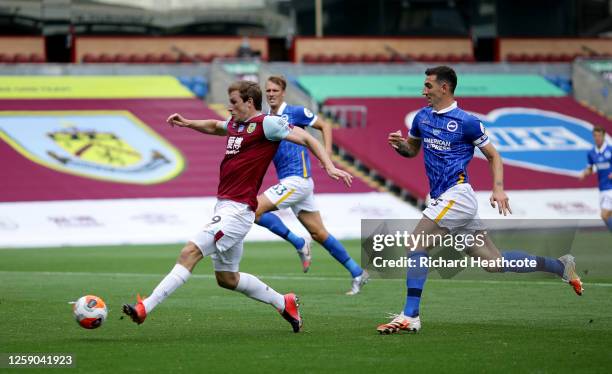 Chris Wood of Burnley scores his sides first goal during the Premier League match between Burnley FC and Brighton & Hove Albion at Turf Moor on July...