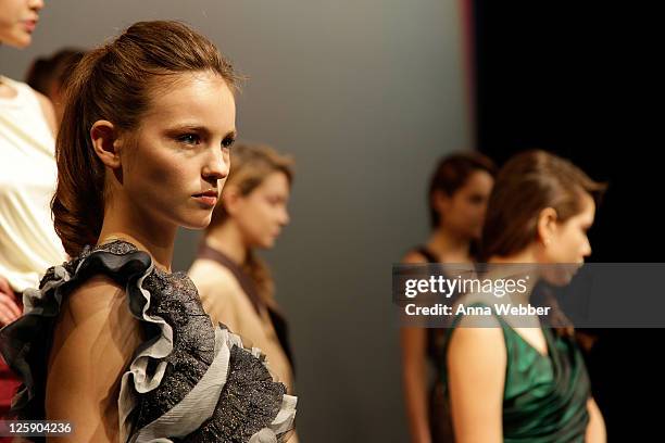 Models pose during the Yuna Yang Fall 2011 presentation during Mercedes-Benz Fashion Week at The Alvin Ailey Citigroup Theater on February 13, 2011...