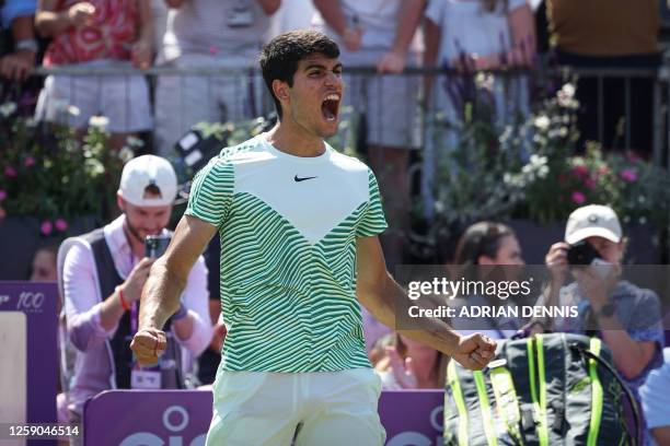 Spain's Carlos Alcaraz celebrates after winning against Australia's Alex de Minaur at the end of their men's singles final match at the Cinch ATP...