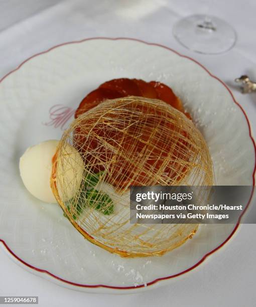 The "Tarte Tatin" carmel apple turnover at Chez Georges restaurant in Houston, Texas July 27,2006. James Nielsen