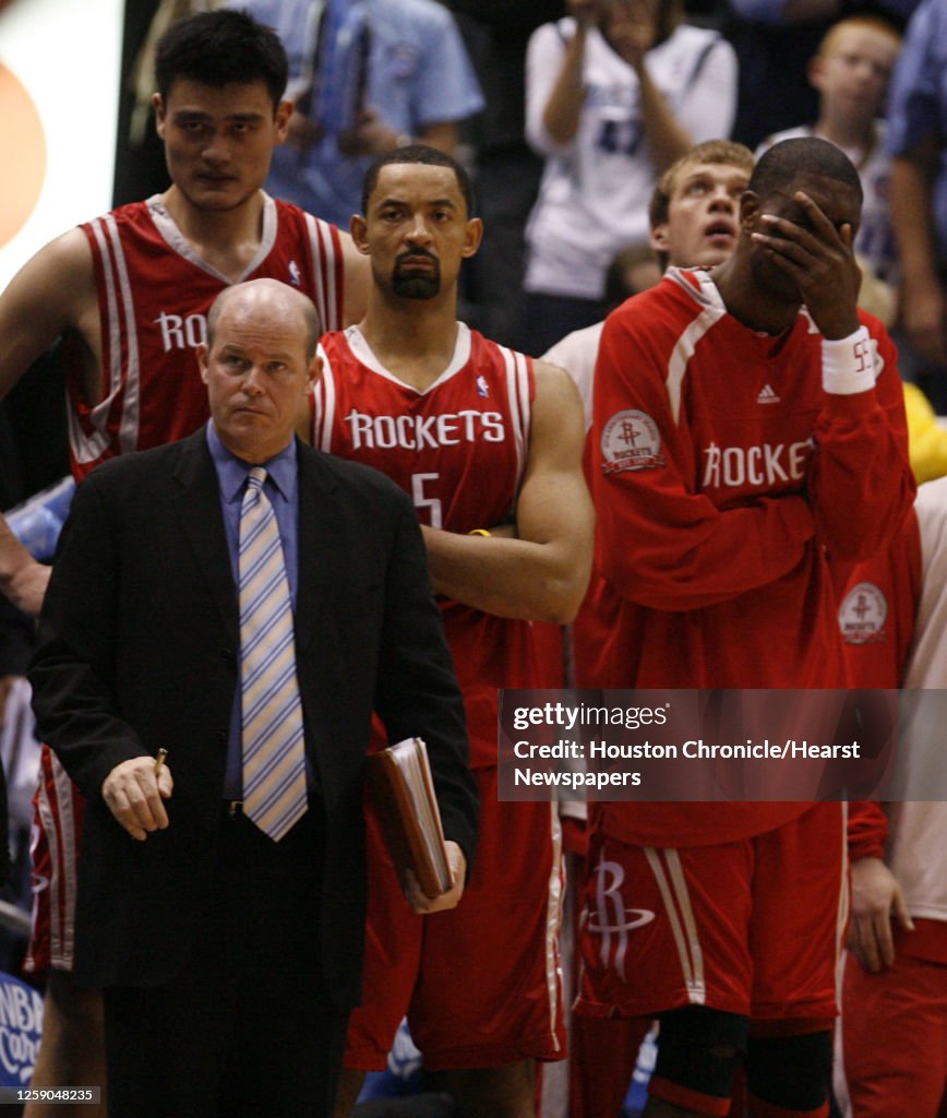 Mutamba Houston Rockets The Houston Rockets Dikembe Mutombo holds his hand over his face near ...