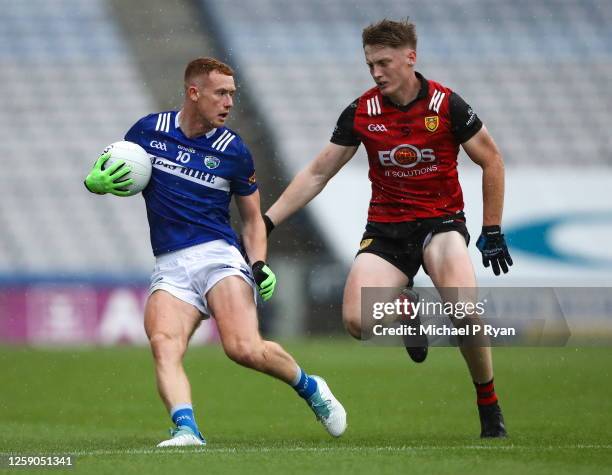 Dublin , Ireland - 25 June 2023; Colm Murphy of Laois in action against Odhran Murdock of Down during the Tailteann Cup Semi Final match between Down...
