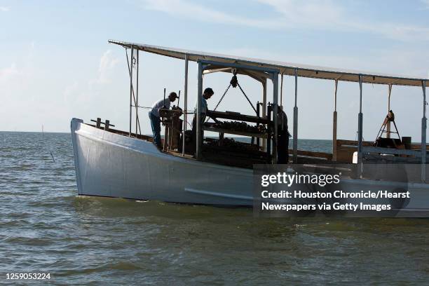 Jeri's Seafood oyster boat Miss Britney works a reef in Galveston's East Bay Monday, Aug. 17 in Smith Point.