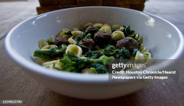 Orecchiette Giorgione "little ear" pasta with broccoli rabe, garlic & oil, spicy lamb meatballs at Giacomo's Cibo e Vino Wednesday, Nov. 25 in...