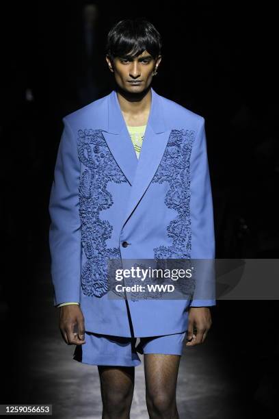 Model on the runway at the TAAKK Spring 2024 Menswear Collection Runway Show at La Maison des Métallos on June 25, 2023 in Paris, France.