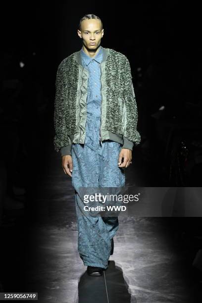 Model on the runway at the TAAKK Spring 2024 Menswear Collection Runway Show at La Maison des Métallos on June 25, 2023 in Paris, France.