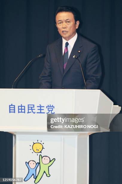 Ruling Liberal Democratic Party Secretary General Taro Aso speaks at the LDP's general meeting with the party's Diet members in Tokyo on September 3,...