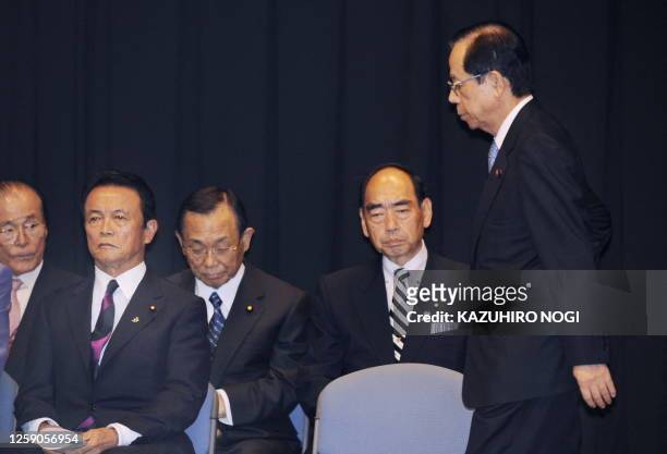 Japan's outgoing Prime Minister Yasuo Fukuda leaves the LDP's general meeting with the party's Diet members in Tokyo on September 3, 2008. The LDP...