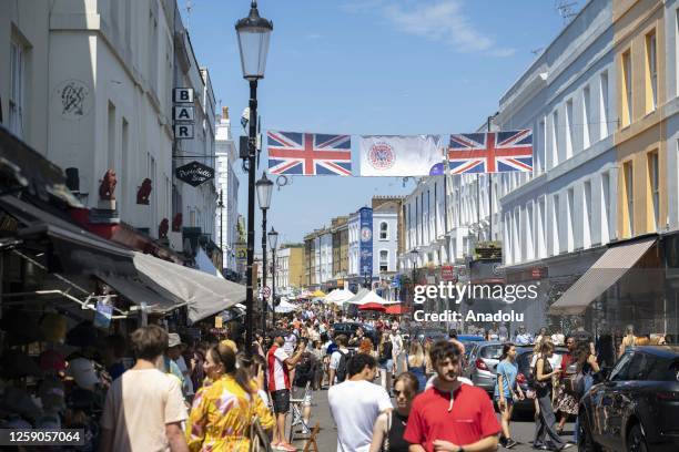 View of Portobello Road Market in London, United Kingdom on June 25, 2023. Portobello Road Market, one of the famous markets of London, attracts the...