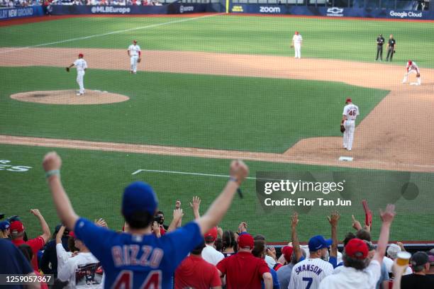 Fans celebrate during the 2023 London Series game between the Chicago Cubs and the St. Louis Cardinals at London Stadium on Sunday, June 25, 2023 in...