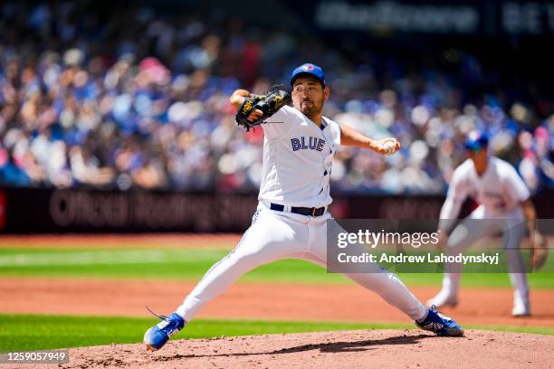 Yusei Kikuchi of the Toronto Blue Jays throws against the Oakland Athletics during the second inning in their MLB game at the Rogers Centre on June...