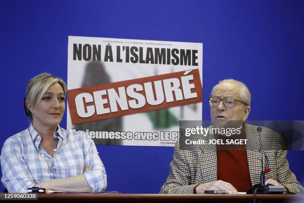 French far-right party Front National president and vice-president, Jean-Marie Le Pen and his daughter Marine give a press conference on March 23,...