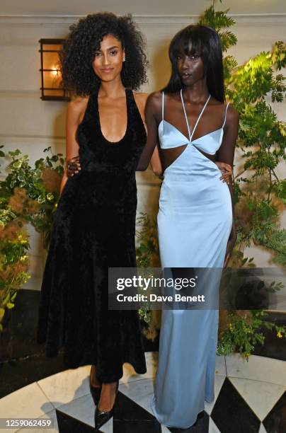 Imaan Hammam and Anok Yai attend the celebration for Fashion Trust Arabia's winners launching into Matches at The Connaught Hotel on June 25, 2023 in...