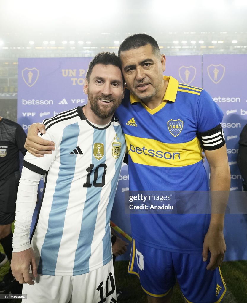 Juan Roman Riquelme Of Boca Juniors Poses With Lionel Messi Of News juan-roman-riquelme-of-boca-juniors-poses-with-lionel-messi-of-news