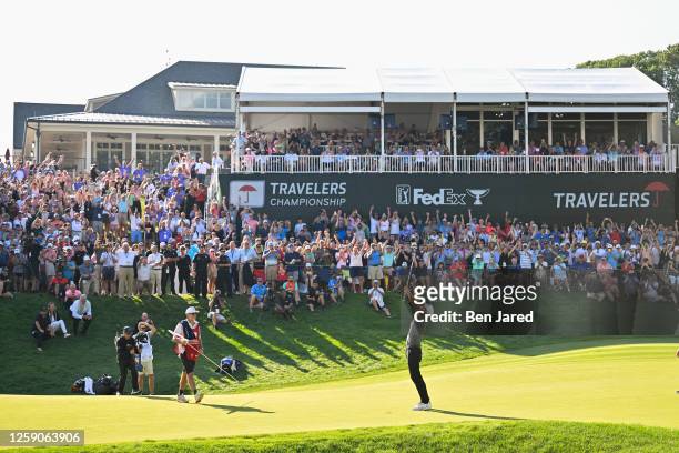 Keegan Bradley celebrates on the 18th green during the final round of the Travelers Championship at TPC River Highlands on June 25, 2023 in Cromwell,...
