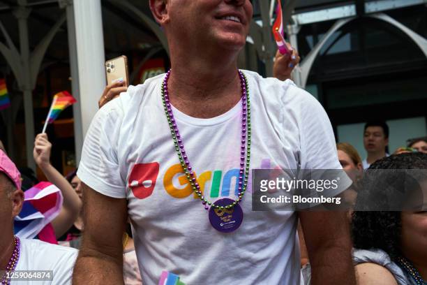 Bystander wears a Grindr t-shirt during the NYC Pride March in New York, US, on Sunday, June 25, 2023. New York City's annual Pride March...