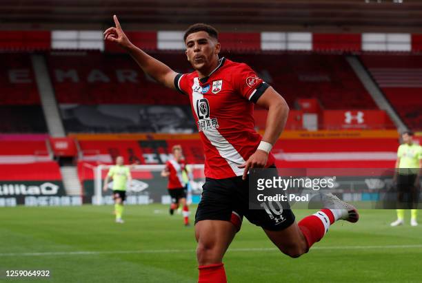 Che Adams of Southampton celebrates after scoring his team's first goal during the Premier League match between Southampton FC and Sheffield United...