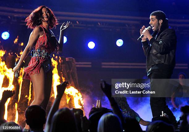 Singer Rihanna and rapper Drake onstage during The 53rd Annual GRAMMY Awards held at Staples Center on February 13, 2011 in Los Angeles, California.