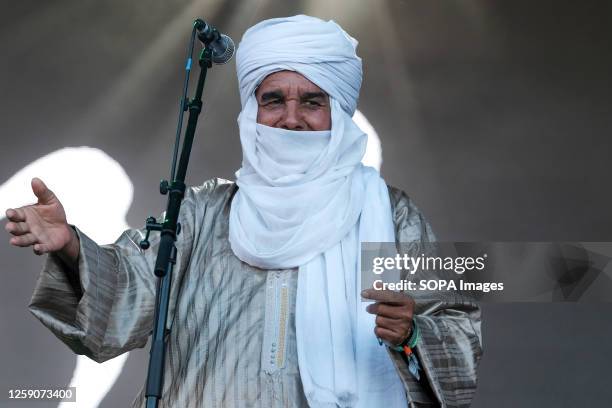 Eyadou ag Leche with a collective of Tuareg musicians from the Sahara Desert region of northern Mali, performing live on stage at Glastonbury...