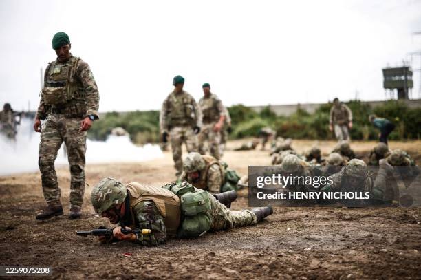 Ukraine Army recruits take part in a training session called "The battle of Innoculation training" with members of Britain's Royal Marines from the...