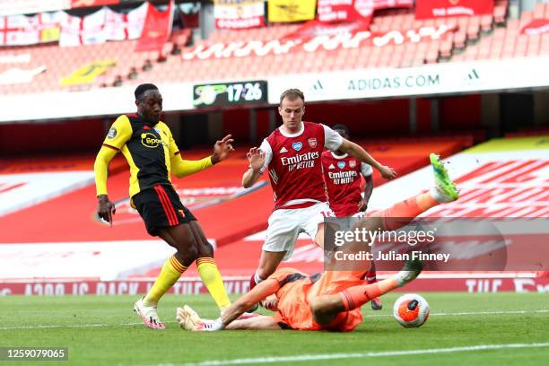 Danny Welbeck of Watford scores his sides second goal during the Premier League match between Arsenal FC and Watford FC at Emirates Stadium on July...
