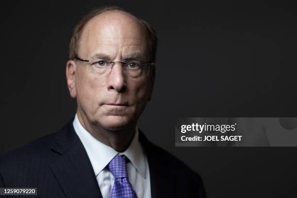 Chairman and CEO of BlackRock Larry Fink poses during a photo session in Paris on June 22, 2023.