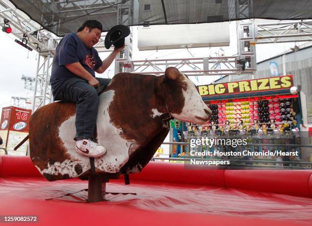 Japanese Bull Rider 393 Mechanical Bull Riding Stock Photos, High-Res Pictures, and Images ...