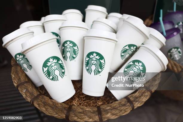 Starbucks Coffee logo is seen on cups in the cafe in Krakow, Poland on June 25, 2023.